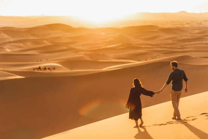 Couple in Morocco Desert Couple in Morocco Desert
