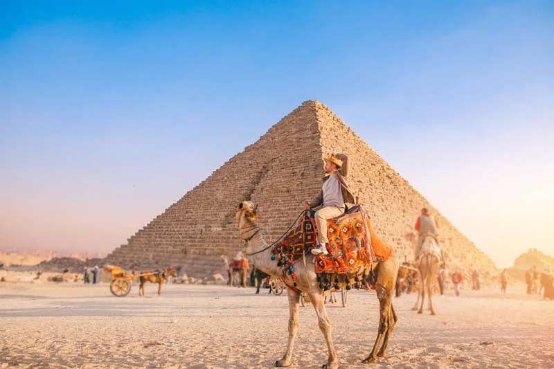 Man in Giza Pyramids, Egypt Christmas Tour Man in Giza Pyramids, Egypt Christmas Tour